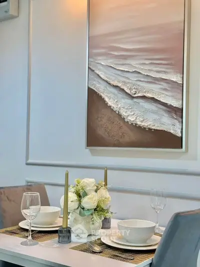 Elegant dining area with modern decor and stylish wall art