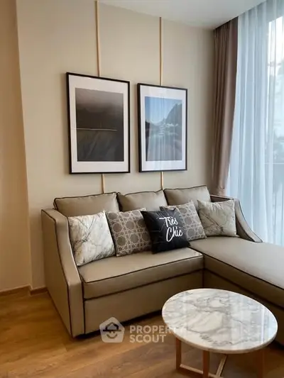Stylish living room with chic decor and cozy seating area, perfect for relaxation.