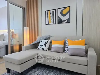 Modern living room with stylish decor and comfortable beige sofa