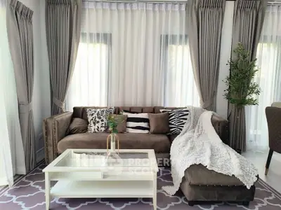 Elegant living room with plush sofa and stylish decor
