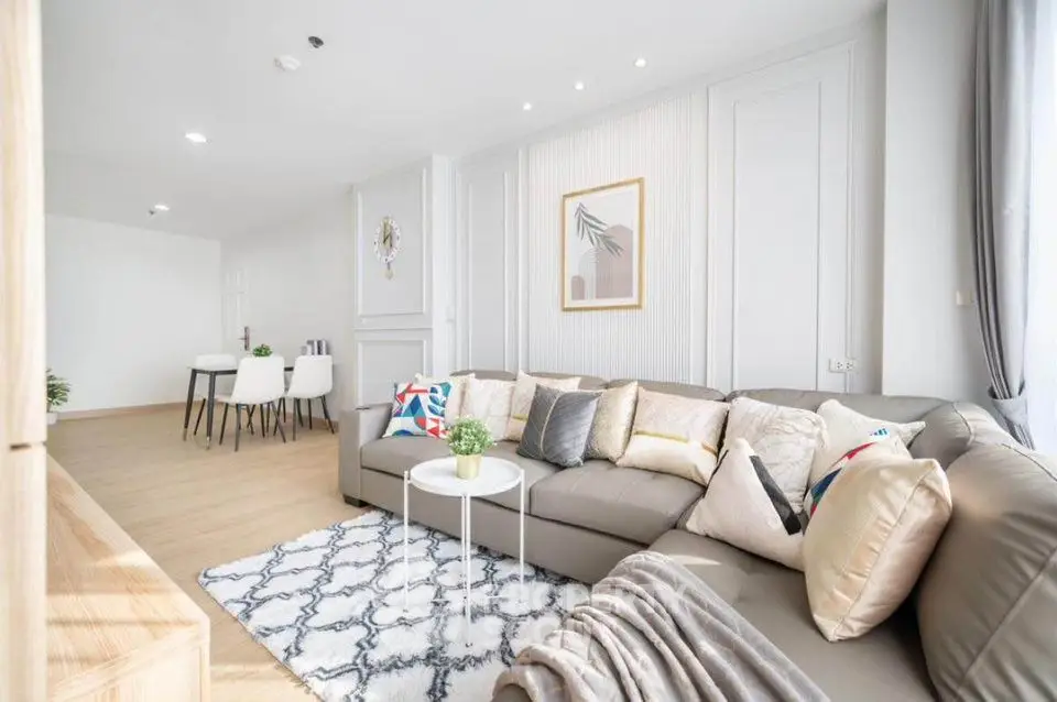 Spacious modern living room with elegant decor and cozy seating area