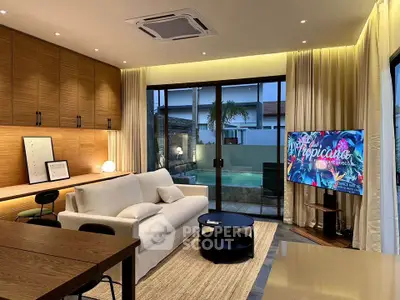 Modern living room with pool view, stylish furniture, and ambient lighting