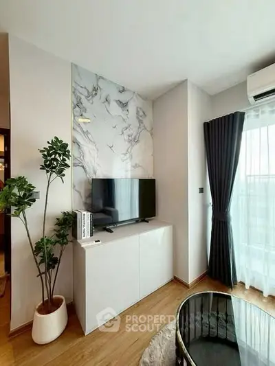 Modern living room with stylish decor and natural light