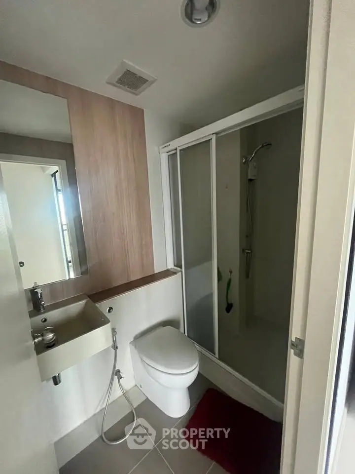 Modern bathroom with sleek shower and minimalist design