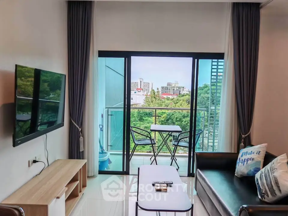 Modern living room with balcony view, sleek furniture, and natural light in urban apartment.