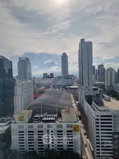 Stunning cityscape view showcasing modern high-rise buildings under a bright sky.