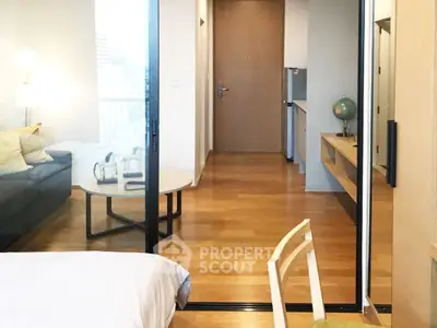 Modern apartment interior with wooden flooring and stylish furniture