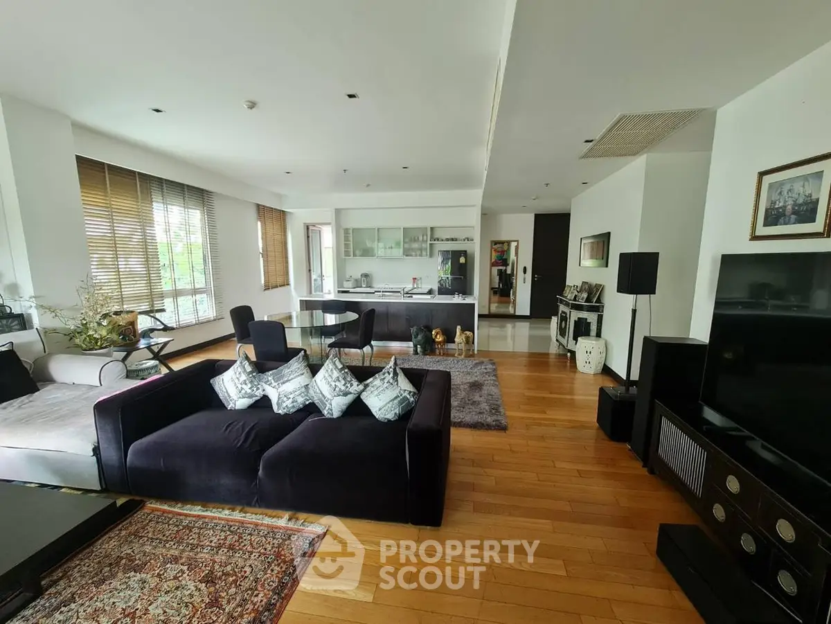 Spacious modern living room with open kitchen and stylish decor