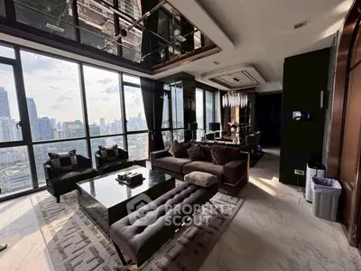 Luxurious high-rise living room with panoramic city views and elegant decor