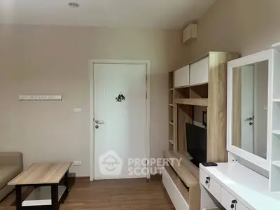 Modern living room with stylish wooden furniture and neutral tones, perfect for cozy living.