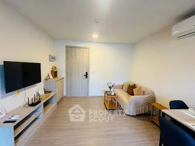 Modern living room with sleek design and cozy furnishings