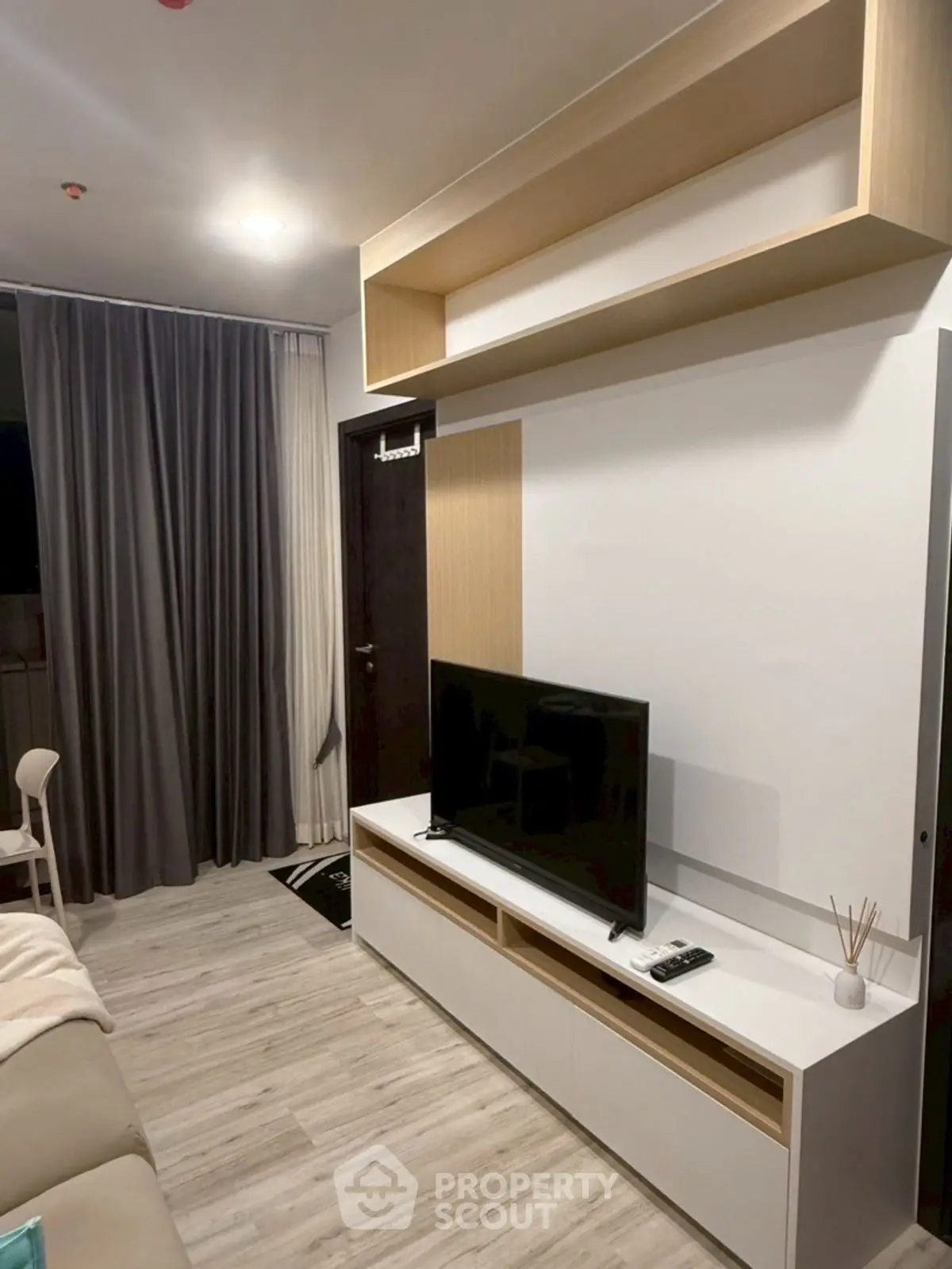 Modern living room with sleek TV unit and stylish decor
