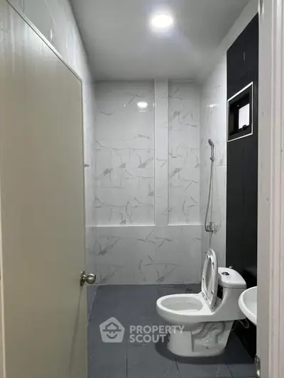 Modern bathroom with sleek design and marble tiles