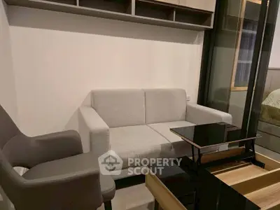 Modern living room with sleek furniture and neutral tones