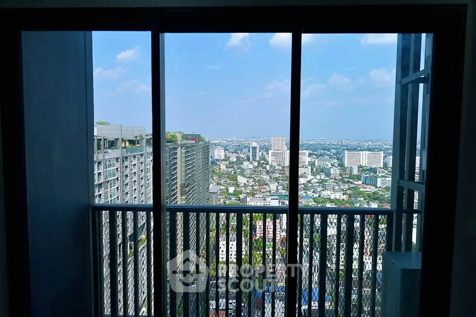 Stunning cityscape view from a high-rise balcony, perfect for urban living enthusiasts.