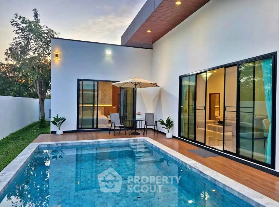 Luxurious modern villa with private pool and elegant patio, perfect for relaxation and entertainment.