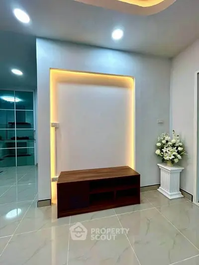 Modern interior with elegant lighting and sleek tile flooring