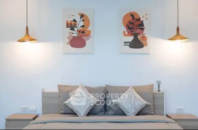 Modern bedroom with stylish decor and cozy lighting