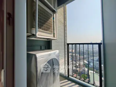 High-rise balcony with city view and air conditioning unit