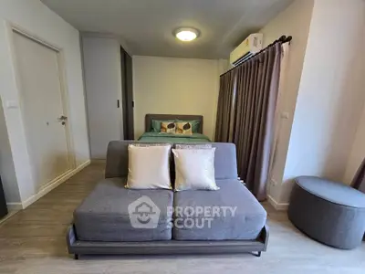 Modern studio apartment with stylish furniture and cozy ambiance