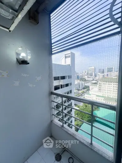 Charming balcony with city view and decorative wall accents