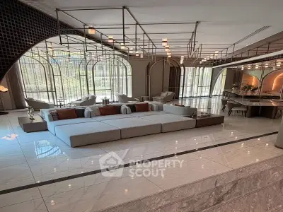 Luxurious modern living room with elegant decor and spacious seating area