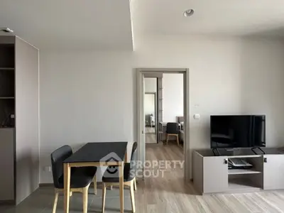 Modern living room with sleek furniture and open layout