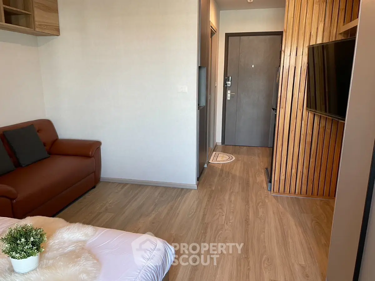 Modern living room with wooden flooring and stylish decor