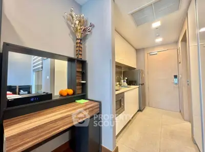 Modern apartment interior with compact kitchen and stylish decor