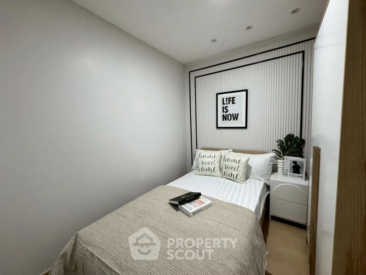 Cozy bedroom with modern decor and stylish wall art