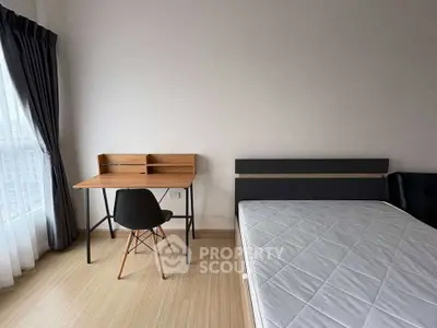 Modern bedroom with minimalist desk and large window view