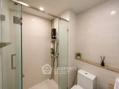 Modern bathroom with glass shower and sleek design