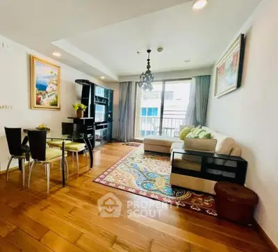 Spacious living room with elegant decor and large window view