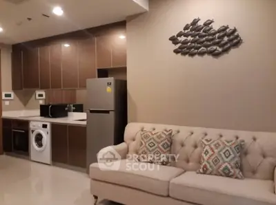 Modern kitchen and living room with stylish decor and appliances