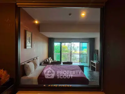 Luxurious bedroom with stunning view and modern decor, featuring a spacious layout and large windows.
