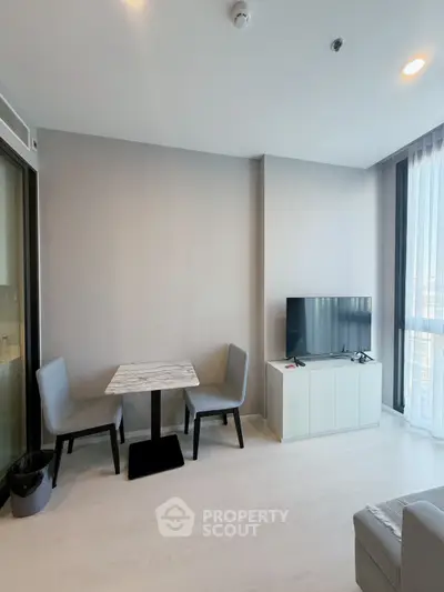 Modern living room with sleek furniture and natural light