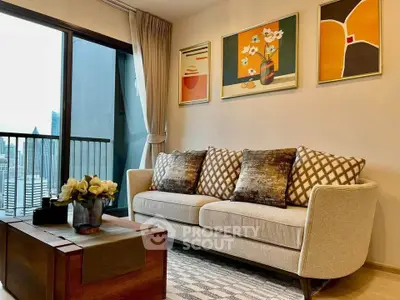 Stylish living room with modern decor and city view balcony, perfect for urban living.