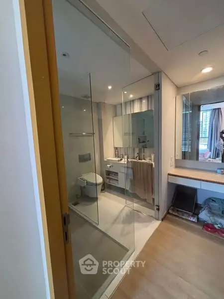 Modern bathroom with glass shower and sleek design