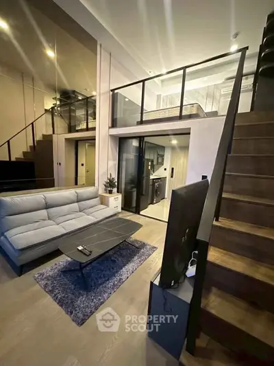 Modern loft apartment with mezzanine bedroom and stylish living area