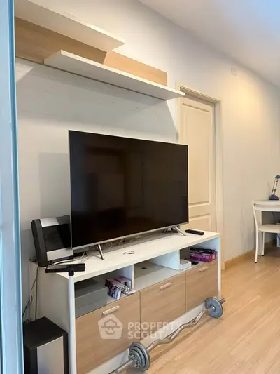 Modern living room with sleek TV stand and contemporary decor