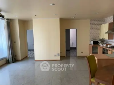 Spacious open-plan kitchen and living area with modern appliances and ample natural light.