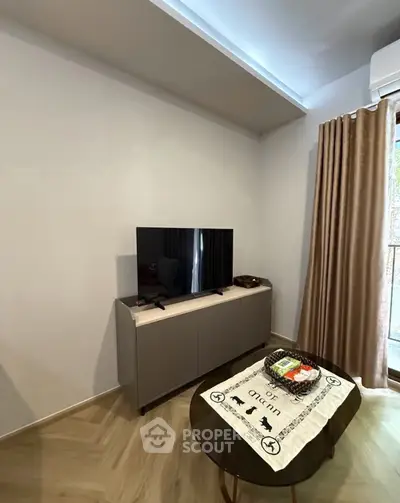 Modern living room with sleek TV stand and stylish decor