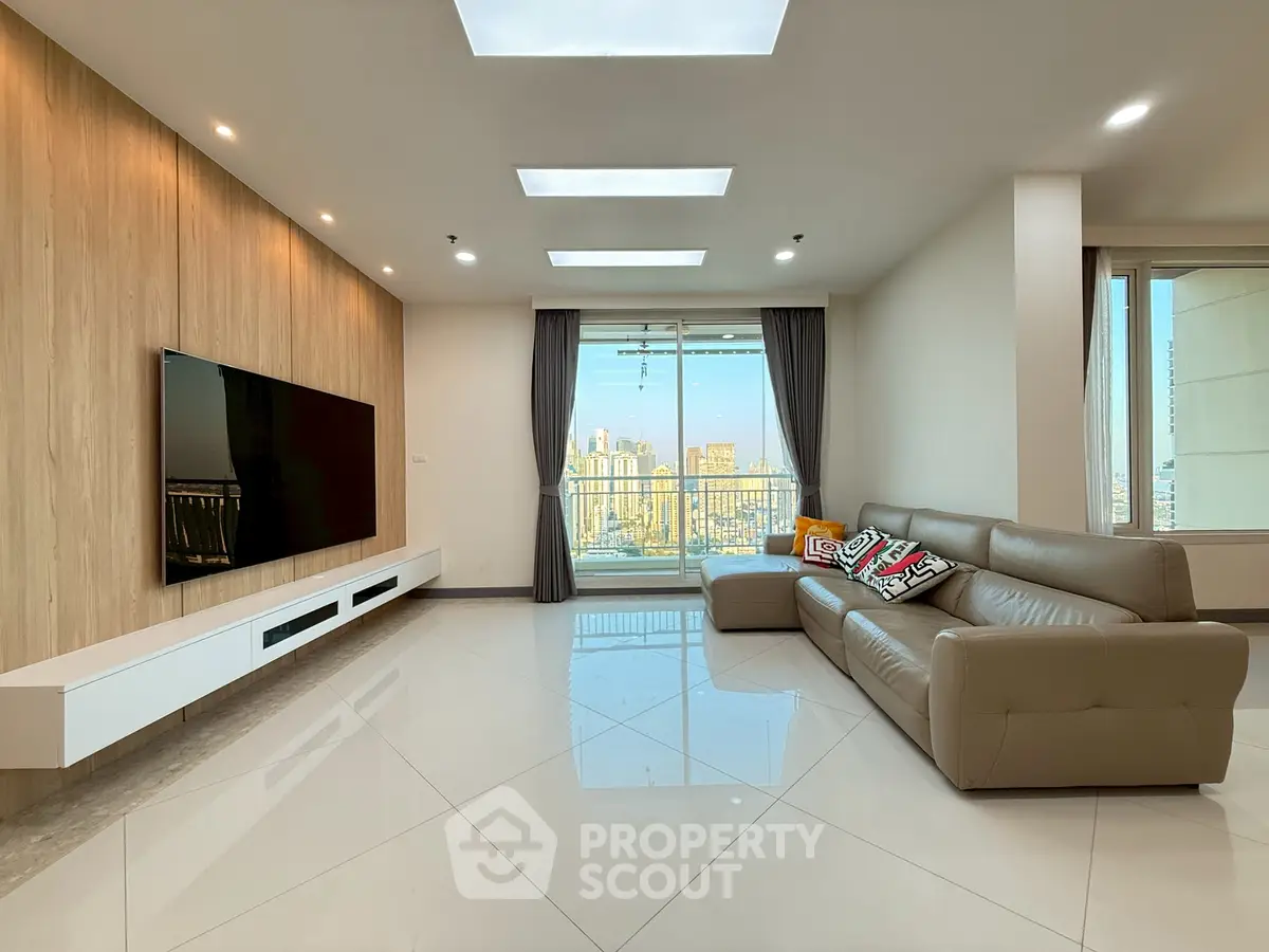 Spacious modern living room with sleek design and city view