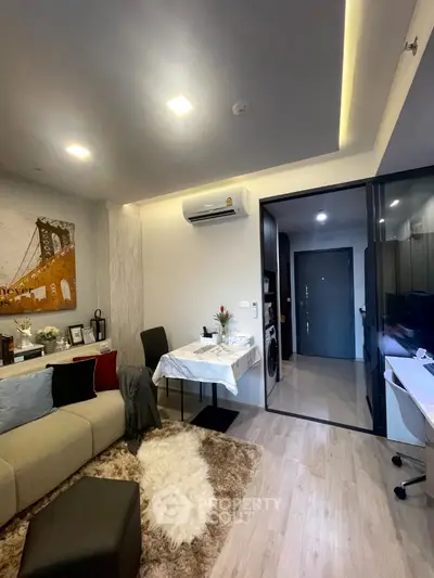 Modern living room with stylish decor and open layout in a contemporary apartment.