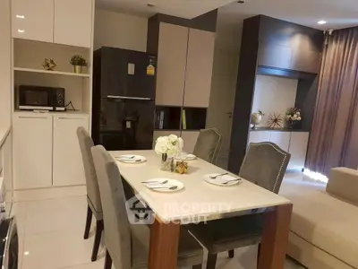 Modern kitchen and dining area with sleek design and elegant decor