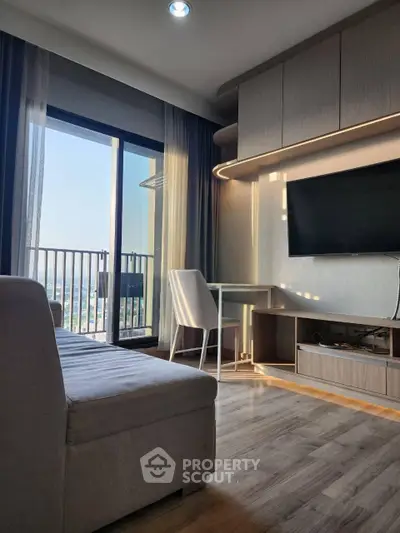 Modern living room with sleek furniture and balcony view, perfect for urban living.