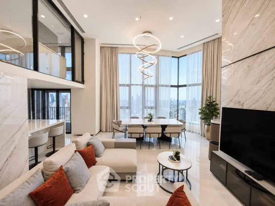 Luxurious modern living room with high ceilings, elegant lighting, and panoramic city views.