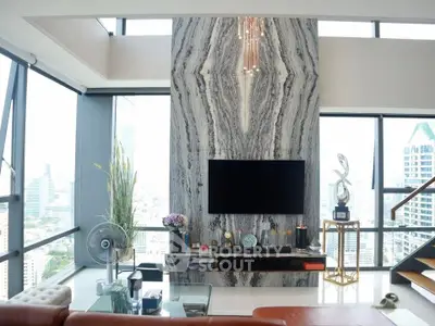 Luxurious modern living room with panoramic city views and elegant decor