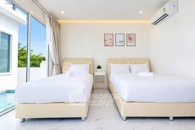 Modern bedroom with two beds, large windows, and pool view in a bright, minimalist design.