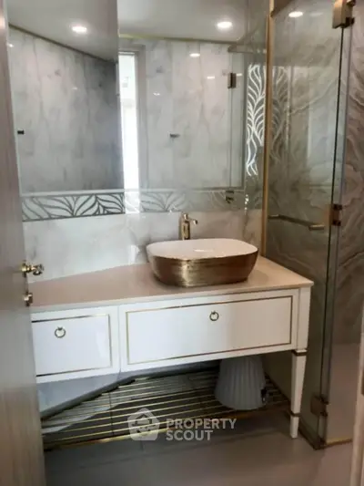 Luxurious bathroom with elegant marble walls and modern fixtures